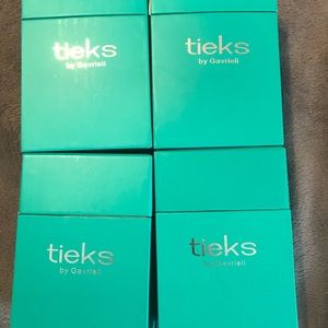 Empty Tieks boxes and bags